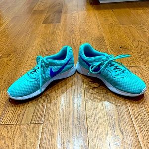 Turquoise Nike tennis shoes